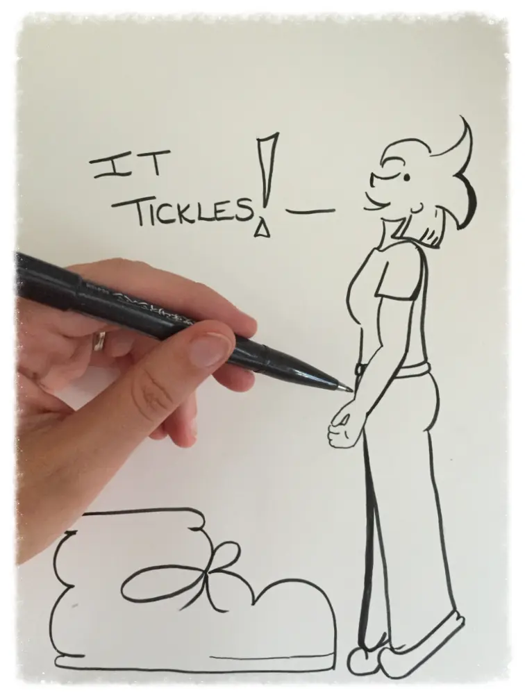 A photograph of the artist drawing Liz