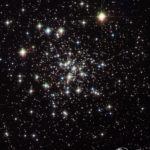 The two things are quite small on the bottom left of the page. They’re looking up at some incredible stars (globular clusters to be precise, not at all visible to the naked eye, but they are amazing clumps of stars). Image credit: ESA/Hubble & NASA, Acknowledgement: Giles Chapdelaine.